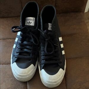 Adidas women’s Black and White Classic platform Sneakers